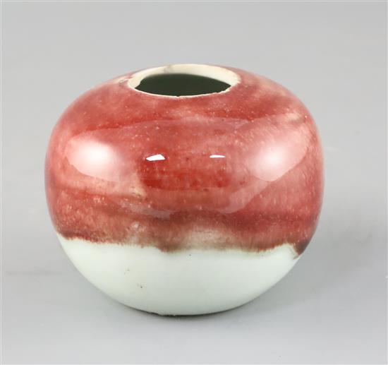 A Chinese copper red and white glazed globular water pot, 18th / 19th century, H.7cm Diam.9cm, firing crack to rim